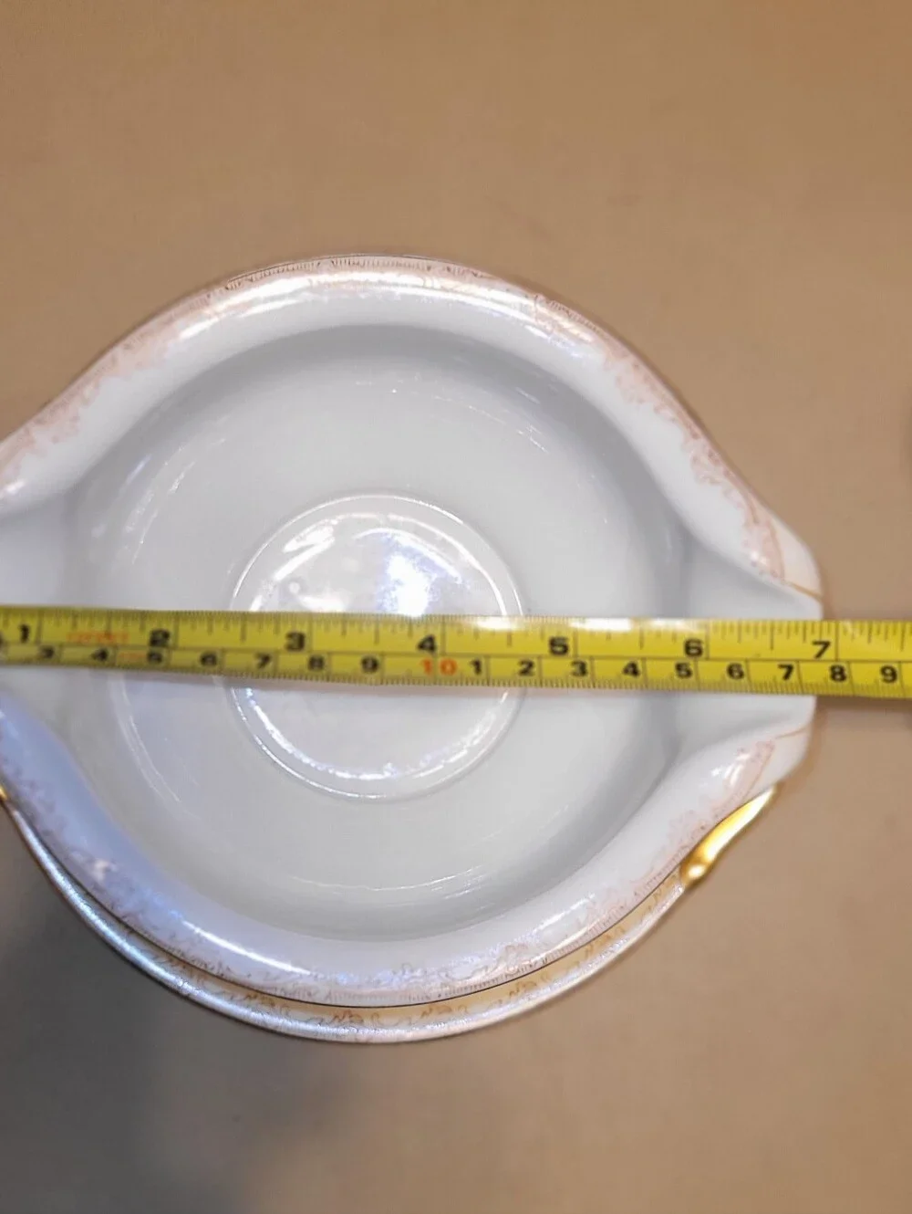 Meito China Hand Painted Porcelain Floral Gravy Boat with Attached Saucer.